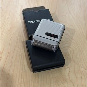 BLoomingdales Portable Silver 🪒 razor Device brand new with box